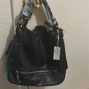 Brand new black, urban expressions, leather BoHo purse.